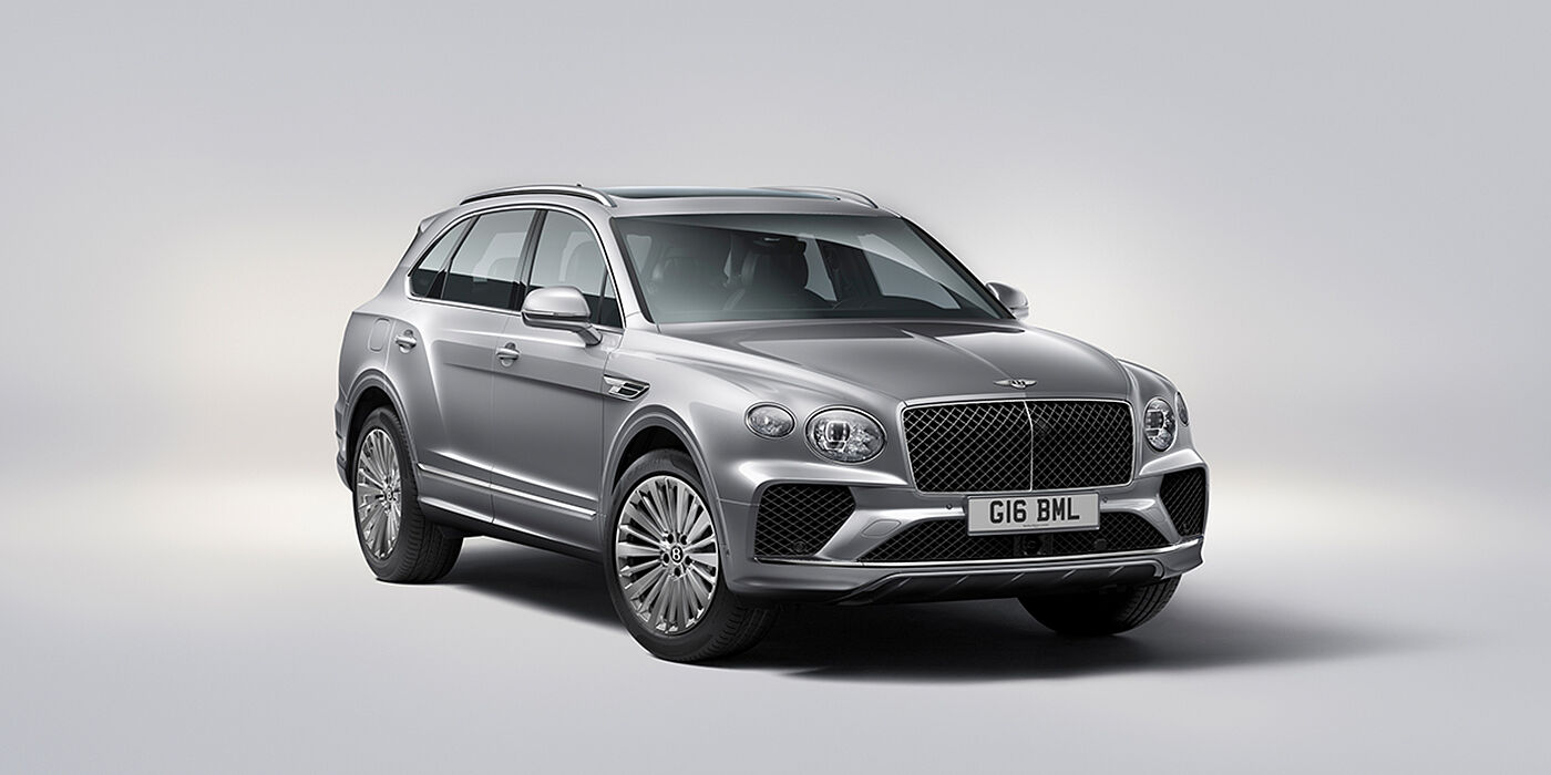 Bentley Rotterdam Bentley Bentayga luxury SUV front three quarter view in Moonbeam paint with matrix grille and 21″ 5 spoke painted wheels