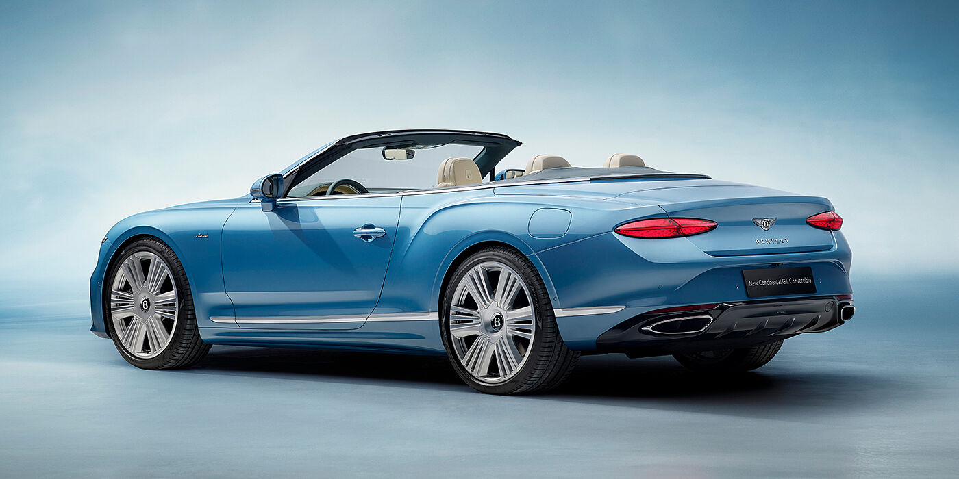 Bentley Rotterdam New Bentley Continental GTC Azure convertible rear view in Light Windsor blue paint with 22 inch ten spoke wheels and chrome exterior details