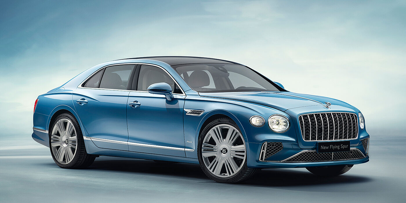 Bentley Rotterdam New Bentley Flying Spur Azure sedan front view in Light windsor blue by Mulliner paint with 22 inch Azure wheels and chrome exterior details
